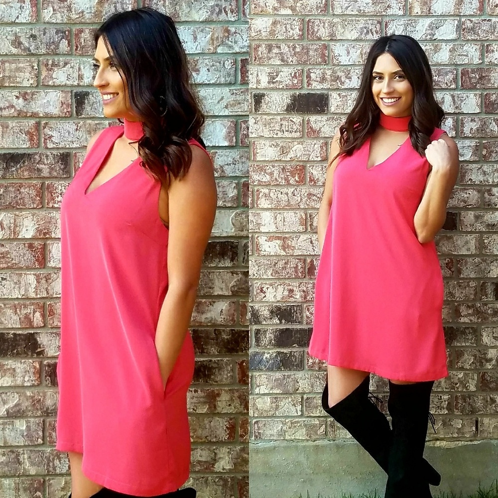 Stunning coral dress.